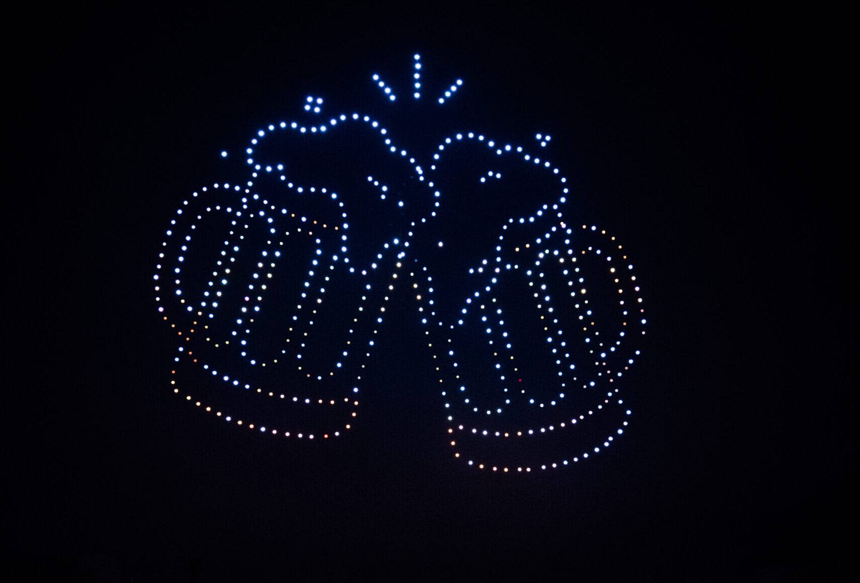 Skydance Drone Light Shows beer mugs drone formation with clinking cheers lights in night sky